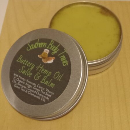 Rooted Relief Herbal Hemp Balm in a jar with natural ingredients like hemp seed oil chamomile and green tea for skin relief