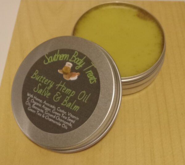 Rooted Relief Herbal Hemp Balm in a jar with natural ingredients like hemp seed oil, chamomile, and green tea for skin relief.