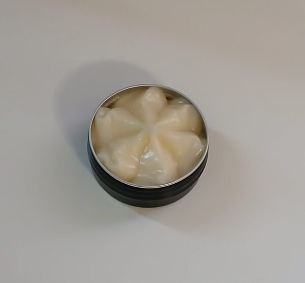 Southern Rose Lip Revival all-natural lip ointment for dry, cracked lips, made with collagen, beeswax, and rose geranium oils.