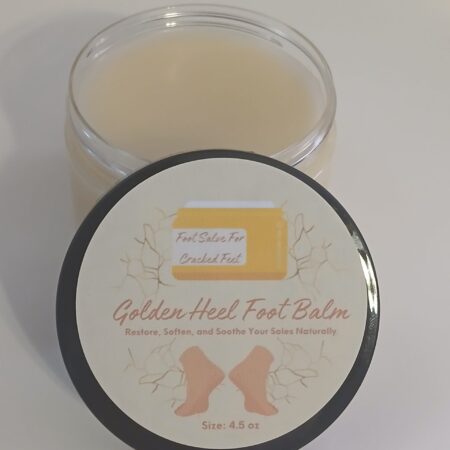 Golden Heel Foot Balm in a rustic jar surrounded by natural ingredients like kokum butter, cocoa butter, and essential oils.