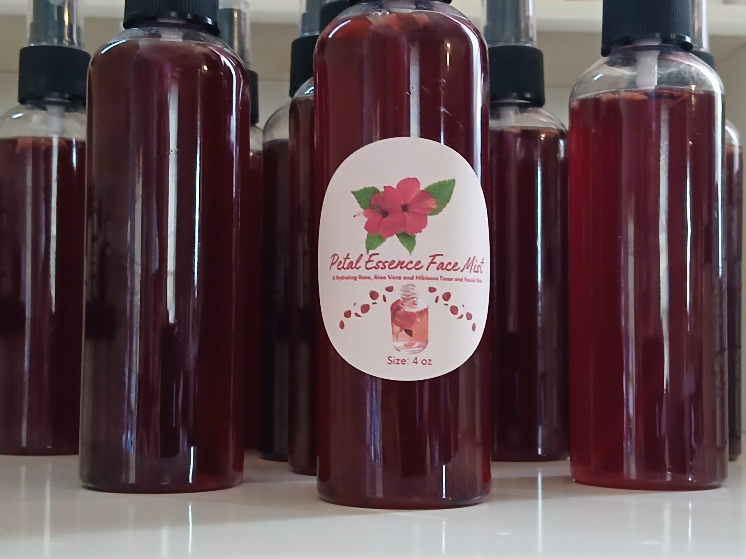 Refreshing rose water and hibiscus face mist with aloe and glycerin for soft dewy skin