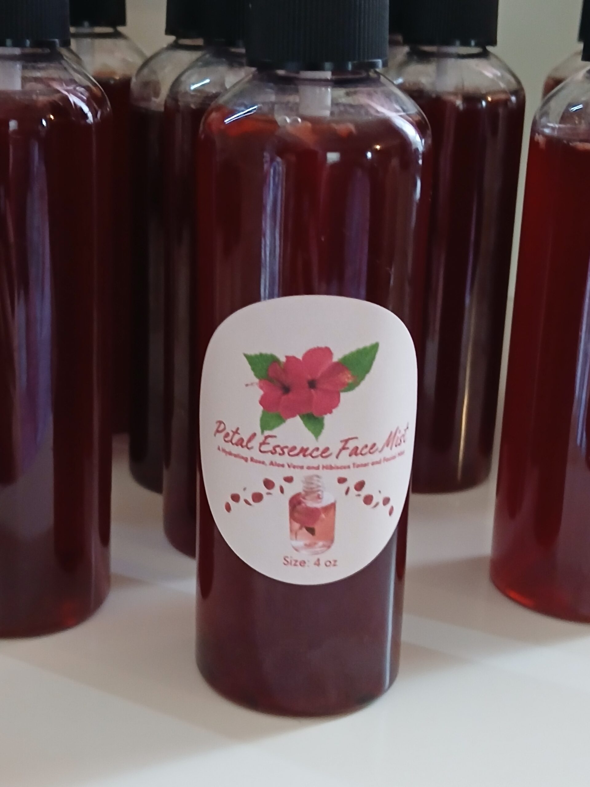 Refreshing rose water and hibiscus face mist with aloe and glycerin for soft dewy skin