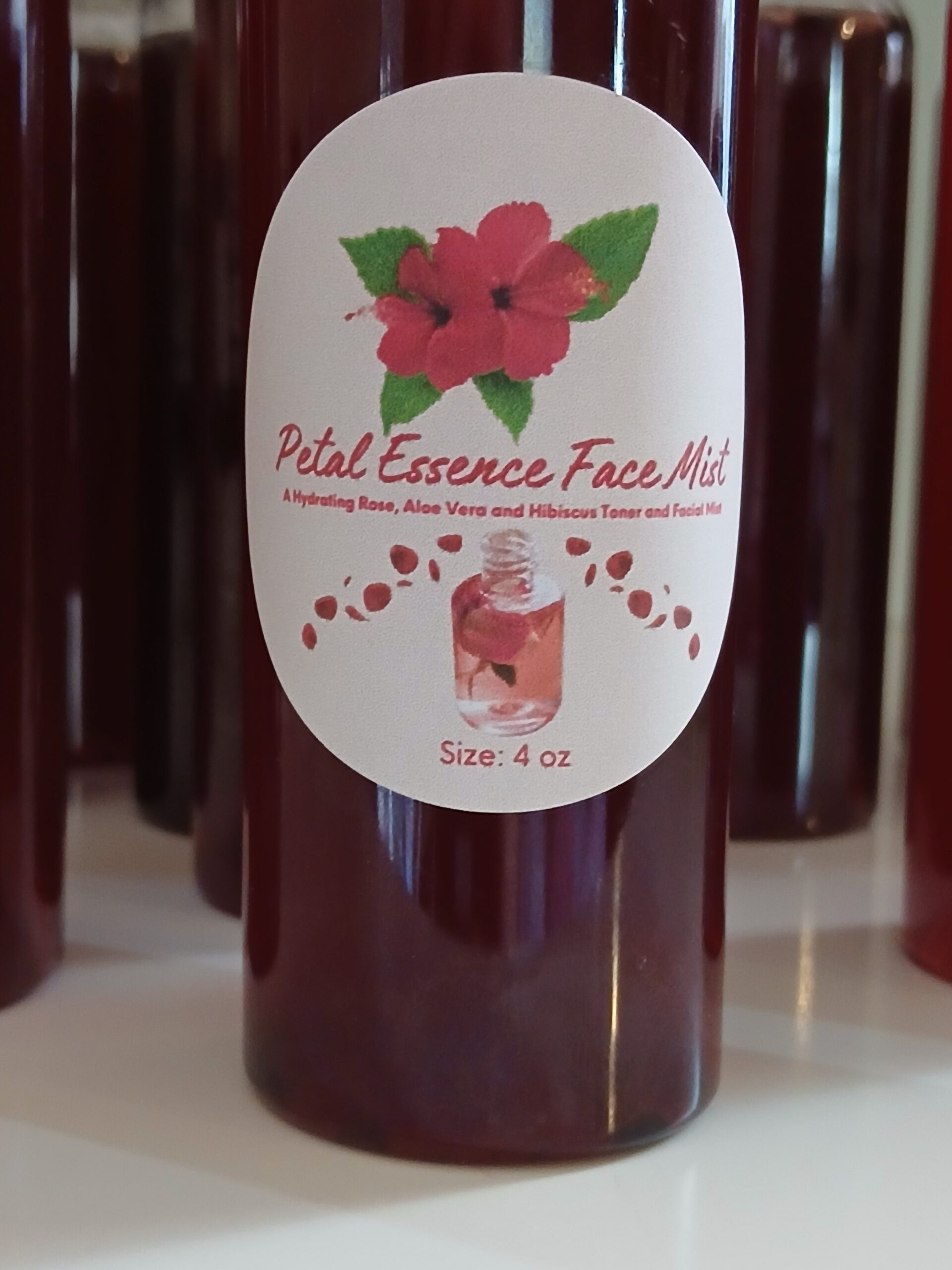 Refreshing rose water and hibiscus face mist with aloe and glycerin for soft dewy skin