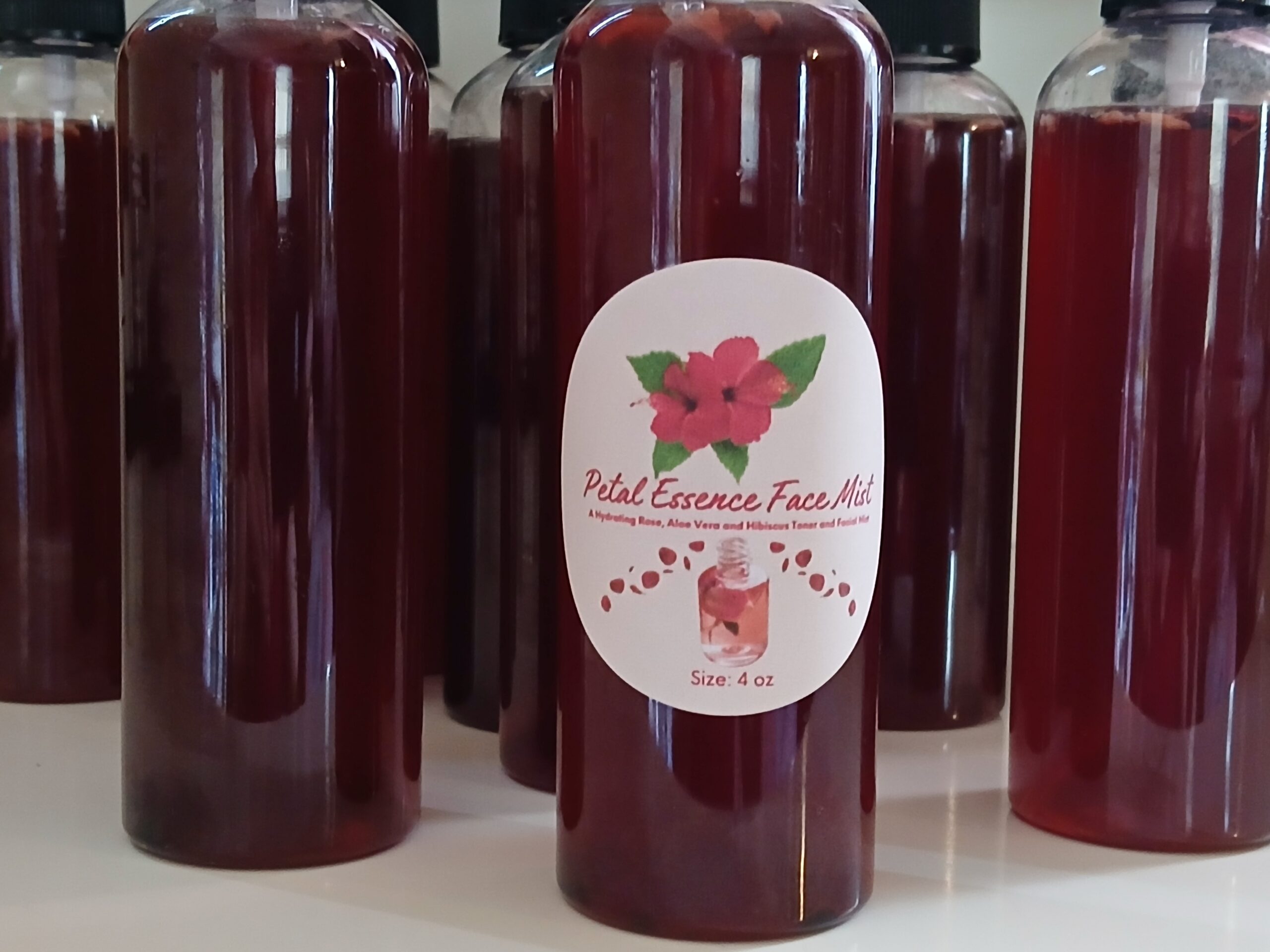 Refreshing rose water and hibiscus face mist with aloe and glycerin for soft dewy skin